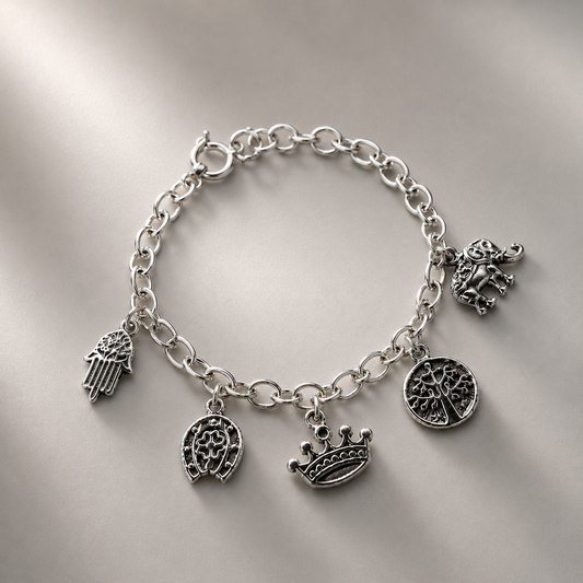 Pulsera de plata 925 con charms de árbol de la vida, corona, elefante, herradura, trebol y mano de Fátima